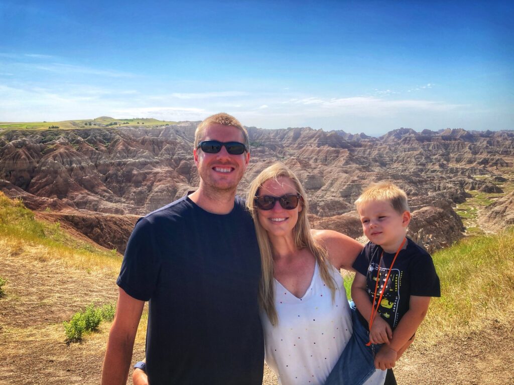 Family in front of badlands